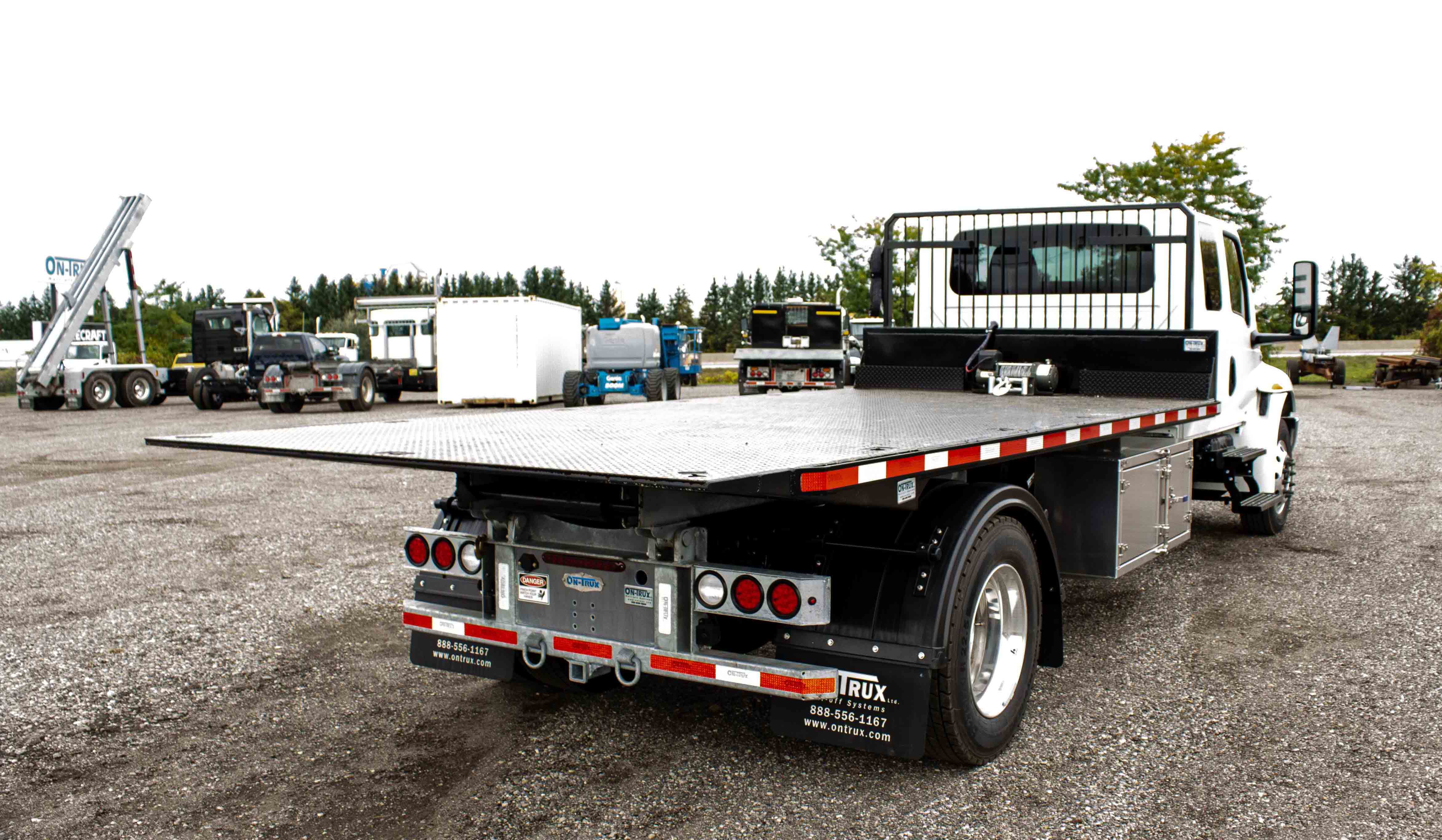SINGLE AXLE ON TRUX ROLL OFF SYSTEM INTERNATIONAL MV EXTENDED CAB (10)